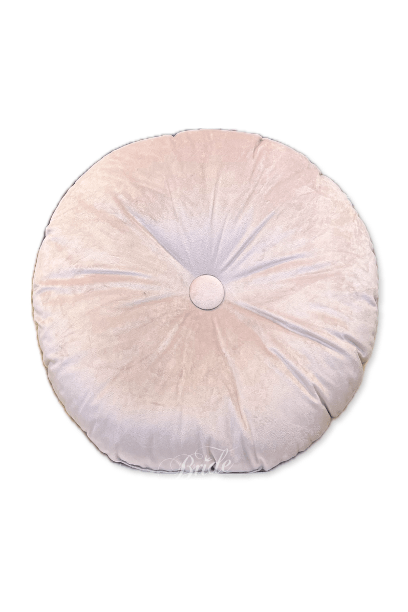 Różowa okrągła poduszka dekoracyjna